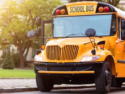 On-board cameras and GPS tracking for safe student transport.